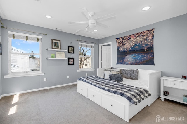carpeted bedroom with recessed lighting, baseboards, and attic access