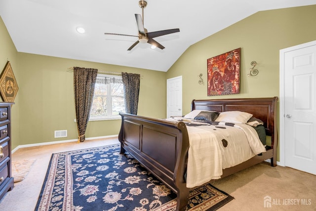 bedroom featuring visible vents, carpet flooring, a ceiling fan, and lofted ceiling