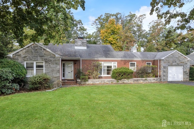 single story home featuring a front yard and a garage