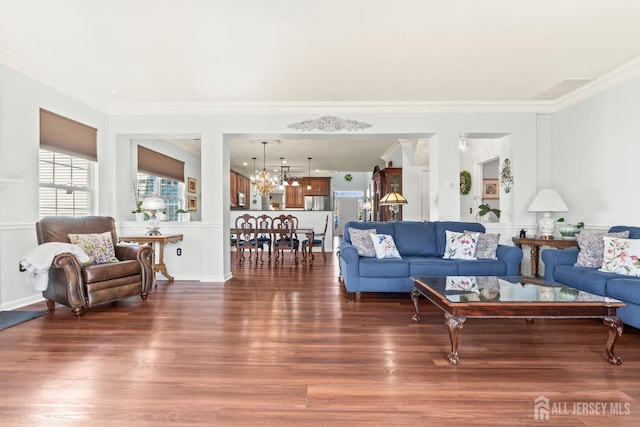 31 Mcgowan Ct, Old Bridge, NJ 08857 - living area with a chandelier, wood finished floors, and ornamental molding