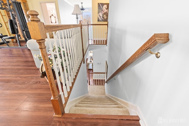 31 Mcgowan Ct, Old Bridge, NJ 08857 - staircase with baseboards and wood finished floors