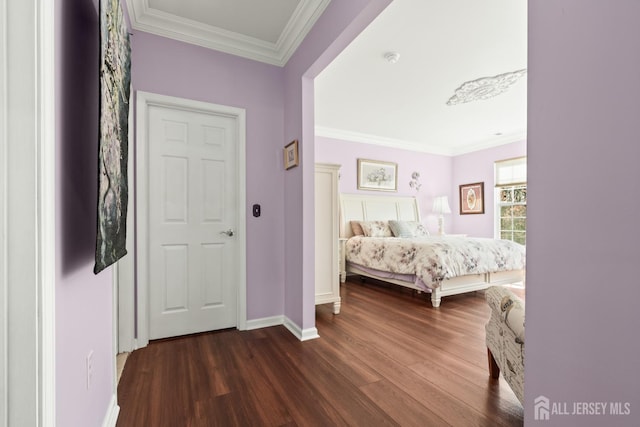 31 Mcgowan Ct, Old Bridge, NJ 08857 - bedroom with crown molding and dark wood-style flooring