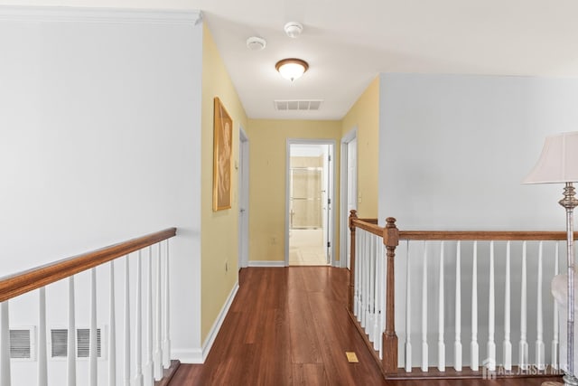 31 Mcgowan Ct, Old Bridge, NJ 08857 - hallway featuring wood finished floors and an upstairs landing