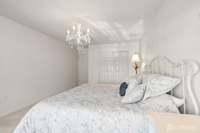 31 Mcgowan Ct, Old Bridge, NJ 08857 - carpeted bedroom featuring a chandelier and a closet