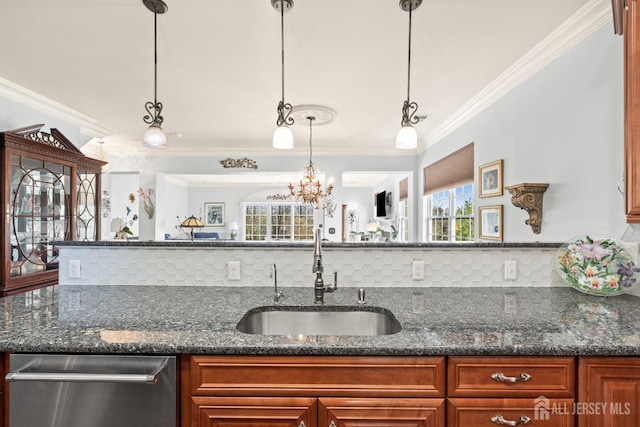 31 Mcgowan Ct, Old Bridge, NJ 08857 - kitchen with backsplash, crown molding, stainless steel dishwasher, dark stone counters, and pendant lighting