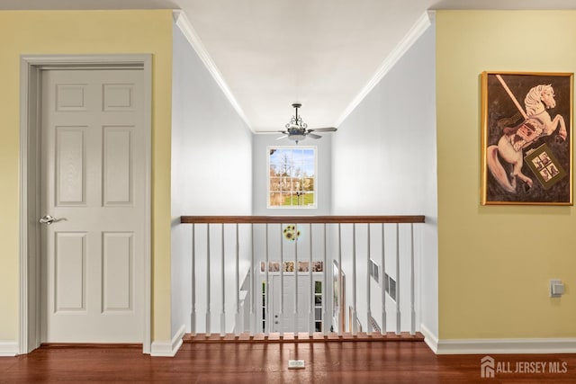31 Mcgowan Ct, Old Bridge, NJ 08857 - corridor with ornamental molding, a chandelier, and wood finished floors