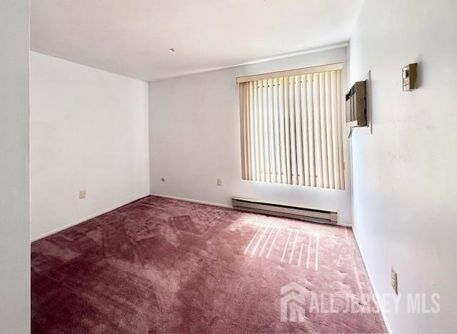 54 Amberly Dr Unit A, Manalapan, NJ 07726 - unfurnished room featuring baseboard heating and carpet flooring