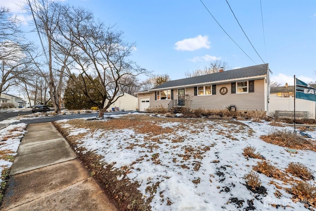 view of front of house featuring fence and a chimney