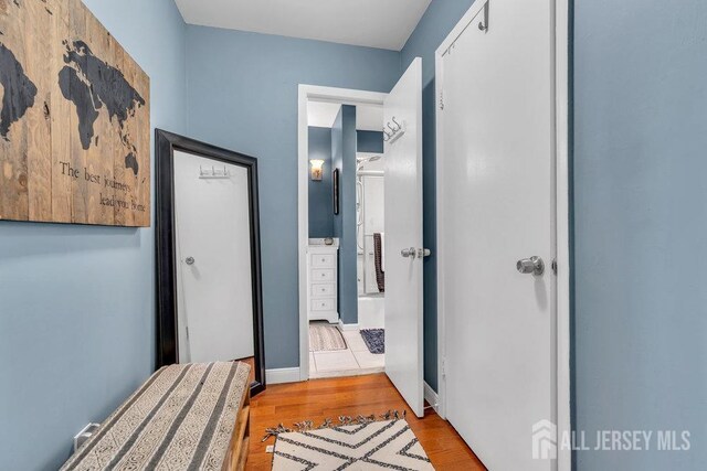 bathroom featuring wood finished floors