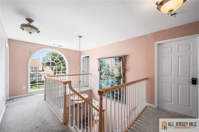 254 Wyoming Ave, Spotswood, NJ 08884 - hall featuring an upstairs landing and carpet flooring
