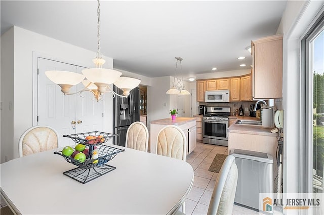 254 Wyoming Ave, Spotswood, NJ 08884 - dining room with recessed lighting, light tile patterned flooring, and a chandelier