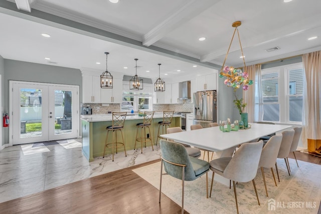 dining room with french doors, recessed lighting, beam ceiling, and ornamental molding