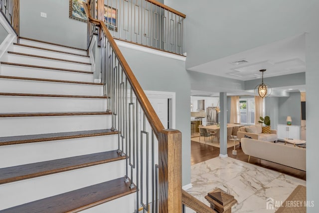 stairs with marble look tiles