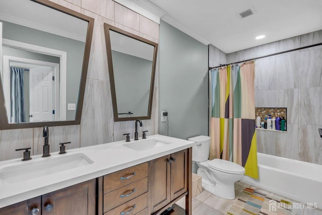 bathroom with toilet, ornamental molding, shower / bath combo with shower curtain, and double vanity