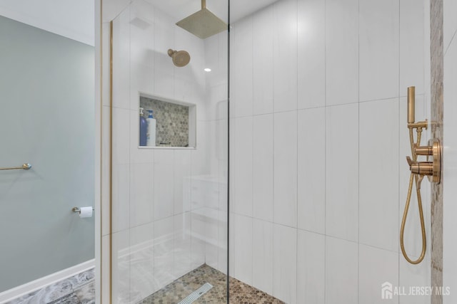 bathroom with a walk in shower