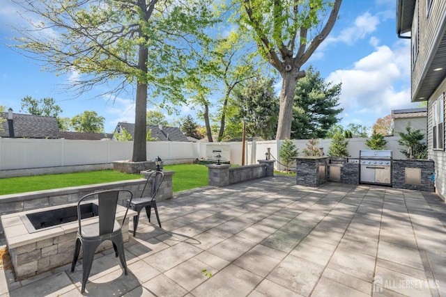 view of patio featuring area for grilling and grilling area
