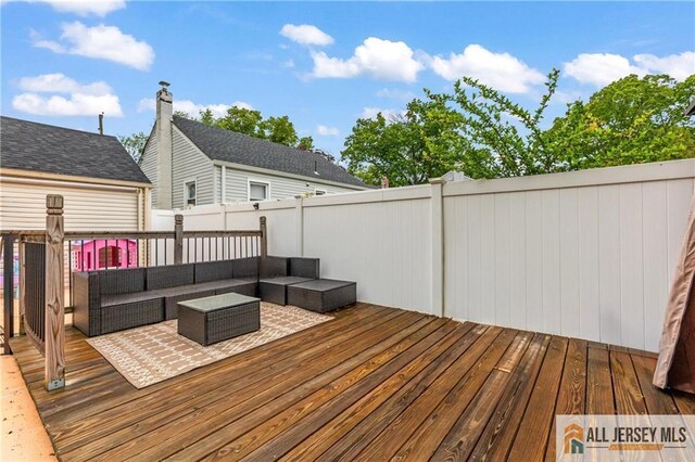 36 George Ave, Old Bridge, NJ 08857 - wooden deck with an outdoor hangout area