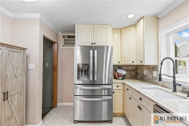 36 George Ave, Old Bridge, NJ 08857 - kitchen with stainless steel appliances, a sink, cream cabinets, baseboards, and light stone countertops