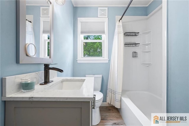 36 George Ave, Old Bridge, NJ 08857 - bathroom with toilet, vanity, wood finished floors, and shower / tub combo with curtain