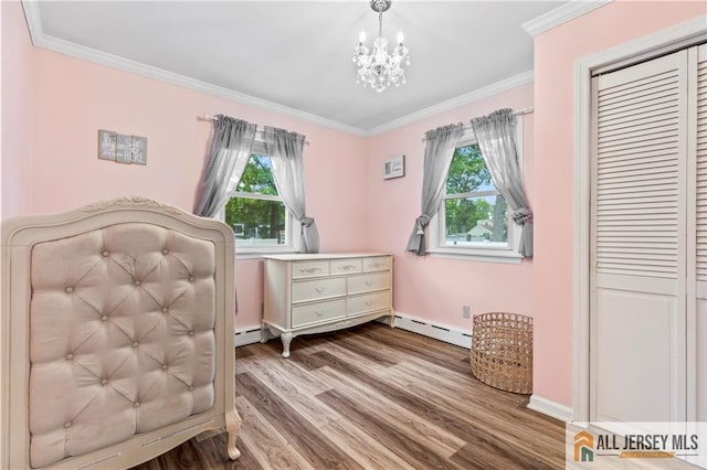 36 George Ave, Old Bridge, NJ 08857 - bedroom with a baseboard radiator, wood finished floors, a chandelier, ornamental molding, and a closet