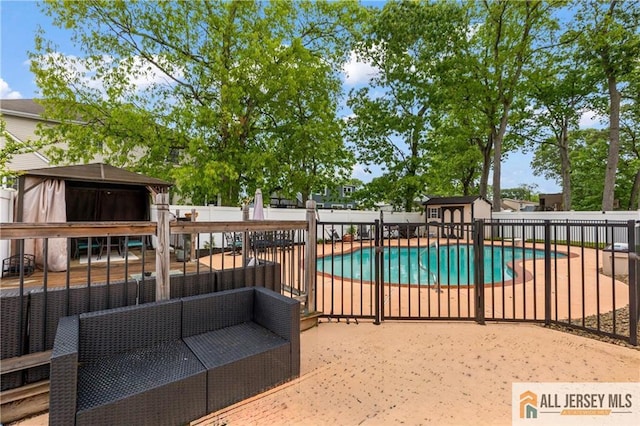 36 George Ave, Old Bridge, NJ 08857 - view of swimming pool with outdoor lounge area, a fenced backyard, and a patio