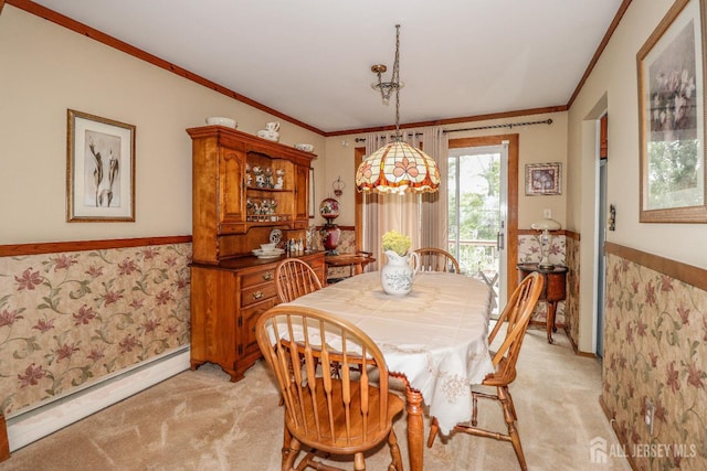 104 Elizabeth Ave, Iselin, NJ 08830 - dining room featuring light carpet, a baseboard heating unit, crown molding, and a wainscoted wall