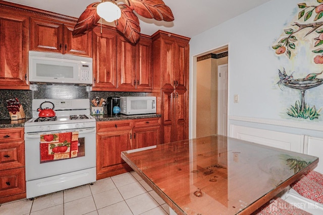 104 Elizabeth Ave, Iselin, NJ 08830 - kitchen with white appliances, decorative backsplash, and light tile patterned floors
