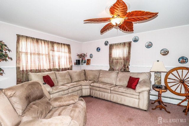 104 Elizabeth Ave, Iselin, NJ 08830 - carpeted living area featuring healthy amount of natural light, ornamental molding, ceiling fan, and baseboard heating