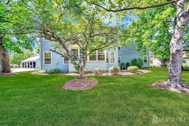 122 Concordia Cir Unit B, Monroe, NJ 08831 - back of house featuring a lawn
