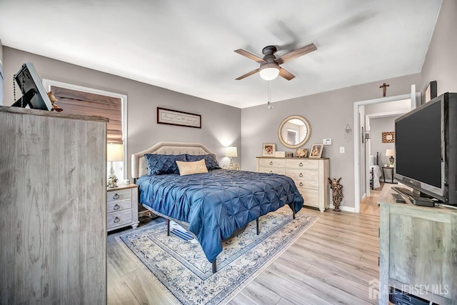 122 Concordia Cir Unit B, Monroe, NJ 08831 - bedroom featuring light wood-style floors, a ceiling fan, and baseboards