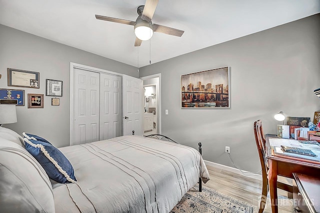 122 Concordia Cir Unit B, Monroe, NJ 08831 - bedroom featuring light wood-style flooring, a closet, and a ceiling fan