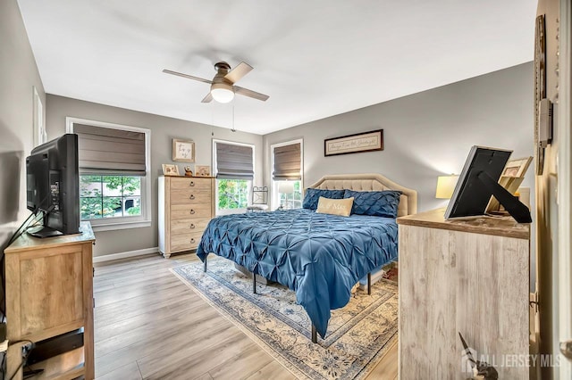 122 Concordia Cir Unit B, Monroe, NJ 08831 - bedroom featuring light wood-style floors, baseboards, and ceiling fan