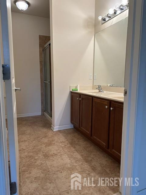 533 E Celebration Way S, Plainfield, NJ 07080 - bathroom with double vanity and a shower stall