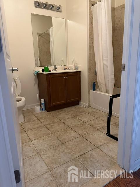 533 E Celebration Way S, Plainfield, NJ 07080 - bathroom featuring vanity, shower / bathtub combination with curtain, and tile patterned floors