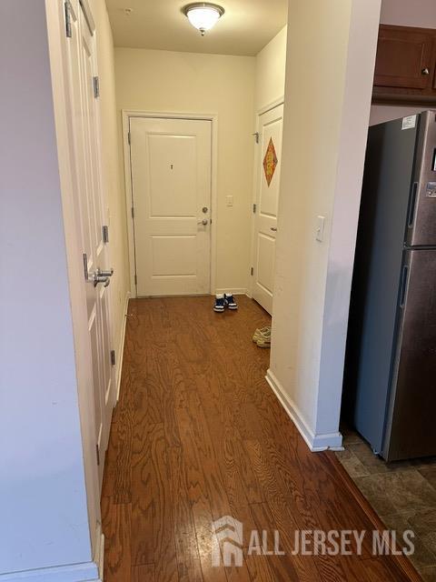533 E Celebration Way S, Plainfield, NJ 07080 - hallway with dark wood finished floors and baseboards