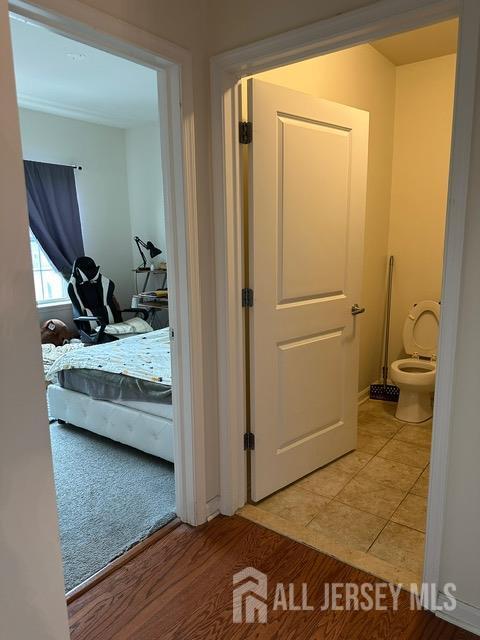 533 E Celebration Way S, Plainfield, NJ 07080 - corridor featuring light tile patterned floors