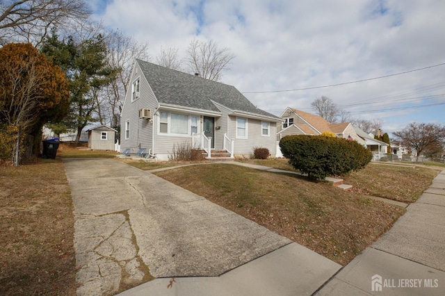 view of front of home with a front lawn