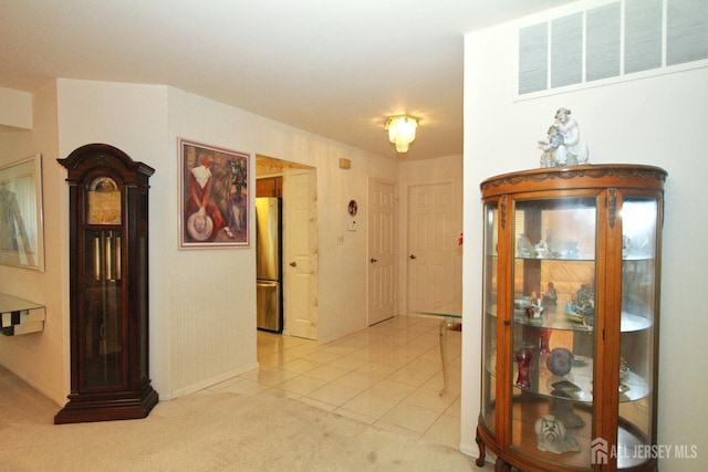 59-A Yorkshire Dr, Monroe, NJ 08831 - corridor with light colored carpet and light tile patterned floors