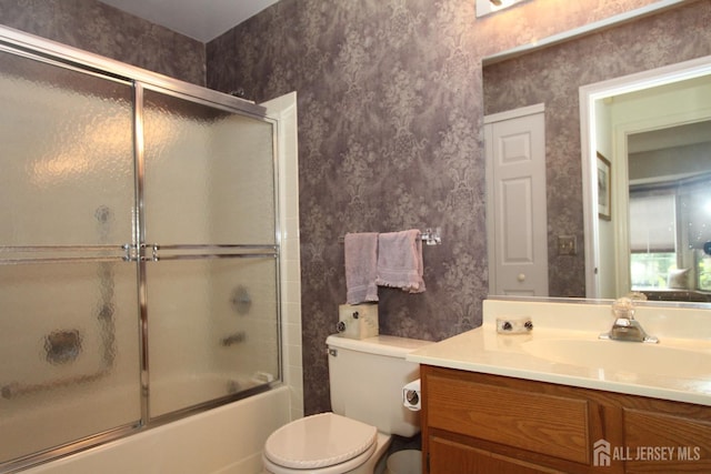 59-A Yorkshire Dr, Monroe, NJ 08831 - bathroom with vanity, wallpapered walls, and shower / bath combination with glass door