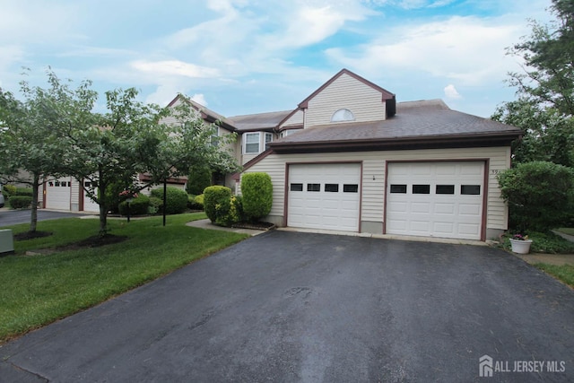 59-A Yorkshire Dr, Monroe, NJ 08831 - view of front of house with driveway, a garage, and a front yard