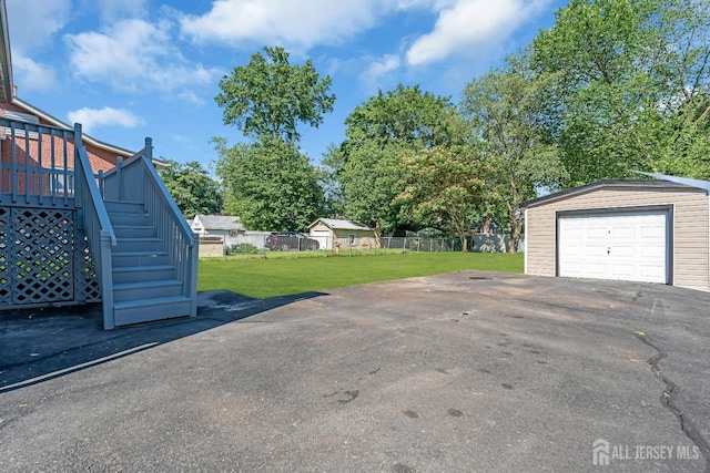 97 Battle Hill Ave, Springfield, NJ 07081 - view of yard with stairway, an outdoor structure, and a garage