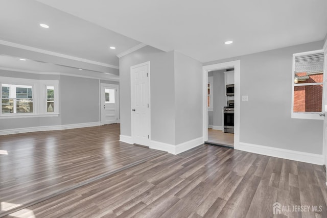 97 Battle Hill Ave, Springfield, NJ 07081 - unfurnished living room with ornamental molding, wood finished floors, and recessed lighting