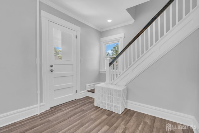 97 Battle Hill Ave, Springfield, NJ 07081 - entryway with wood finished floors, stairway, crown molding, and recessed lighting