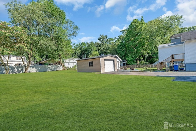 97 Battle Hill Ave, Springfield, NJ 07081 - view of yard with an outbuilding, driveway, and a garage