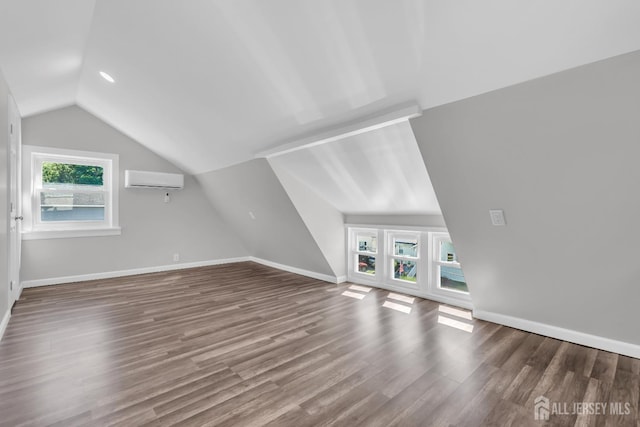 97 Battle Hill Ave, Springfield, NJ 07081 - bonus room featuring lofted ceiling, wood finished floors, and a wall unit AC