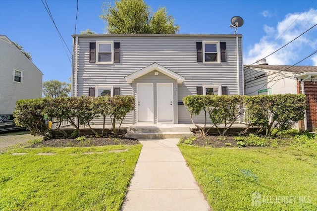 951-953 Amboy Ave, Edison, NJ 08837 - view of front of house featuring a front yard