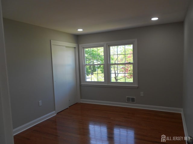 4 Harvey Rd, South Brunswick, NJ 08852 - unfurnished room featuring baseboards, wood finished floors, and recessed lighting