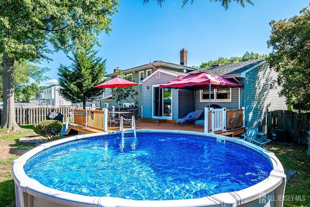 view of pool with a deck