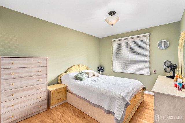 34 Brookside Ave, Old Bridge, NJ 08857 - bedroom with light wood-type flooring and baseboards