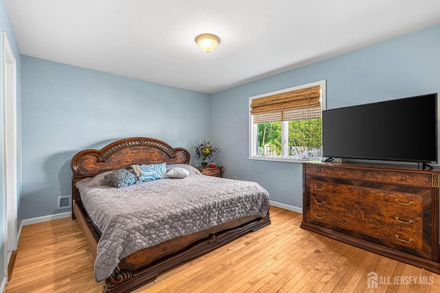 34 Brookside Ave, Old Bridge, NJ 08857 - bedroom with baseboards and hardwood / wood-style flooring